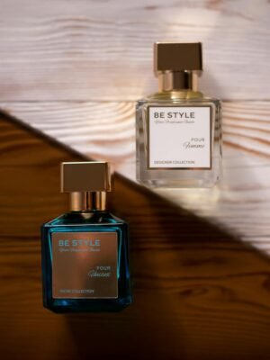 Stylish perfume bottles displayed on a textured wooden background for a modern look.